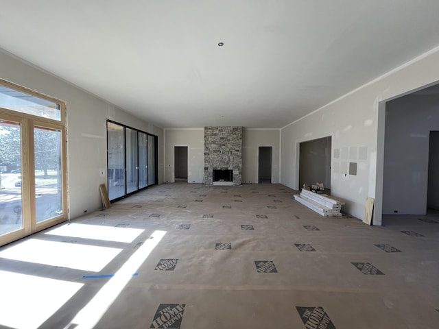 unfurnished living room with a fireplace