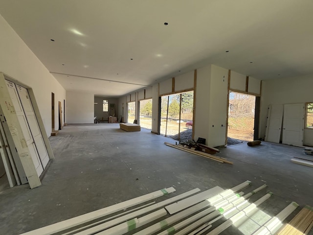 miscellaneous room featuring a high ceiling