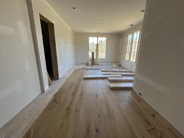 spare room featuring hardwood / wood-style floors