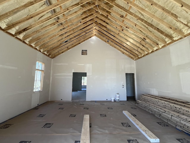 interior space with high vaulted ceiling