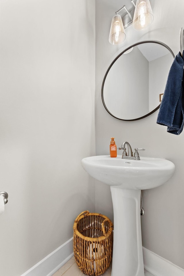 bathroom with tile patterned flooring and sink