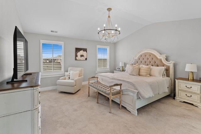 bedroom with light carpet, lofted ceiling, and an inviting chandelier