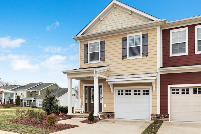 view of front of property featuring a garage