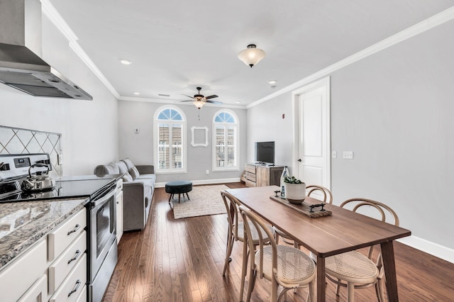 kitchen featuring white cabinetry, stainless steel range with electric stovetop, dark hardwood / wood-style floors, light stone countertops, and range hood