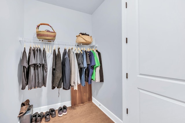 walk in closet featuring light wood-type flooring