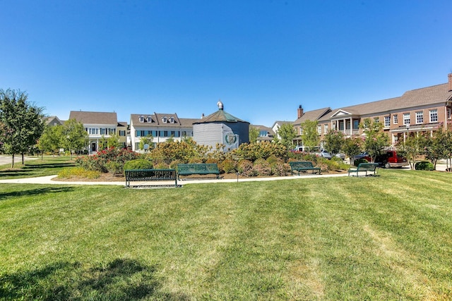 view of home's community featuring a yard