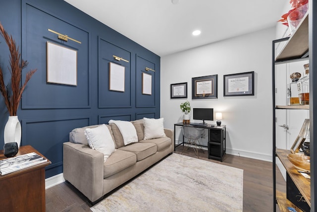 living room with dark hardwood / wood-style floors