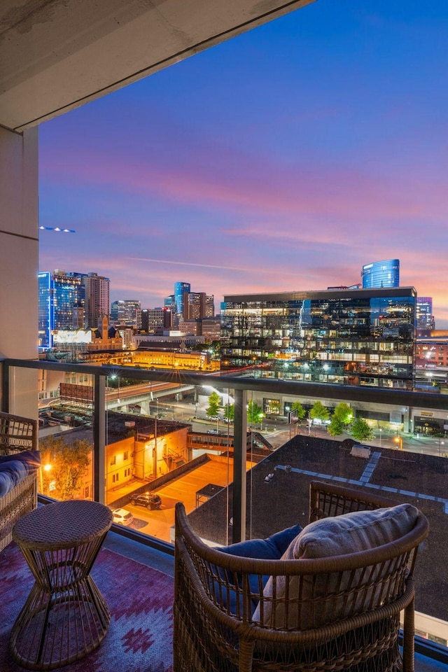 view of balcony at dusk