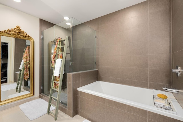 bathroom with shower with separate bathtub