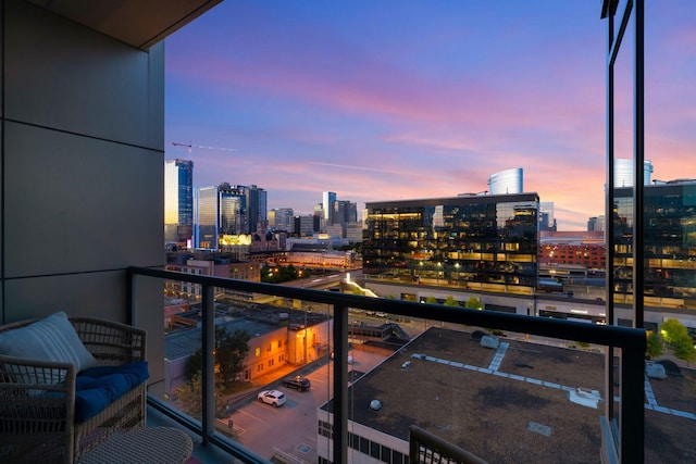 view of balcony at dusk