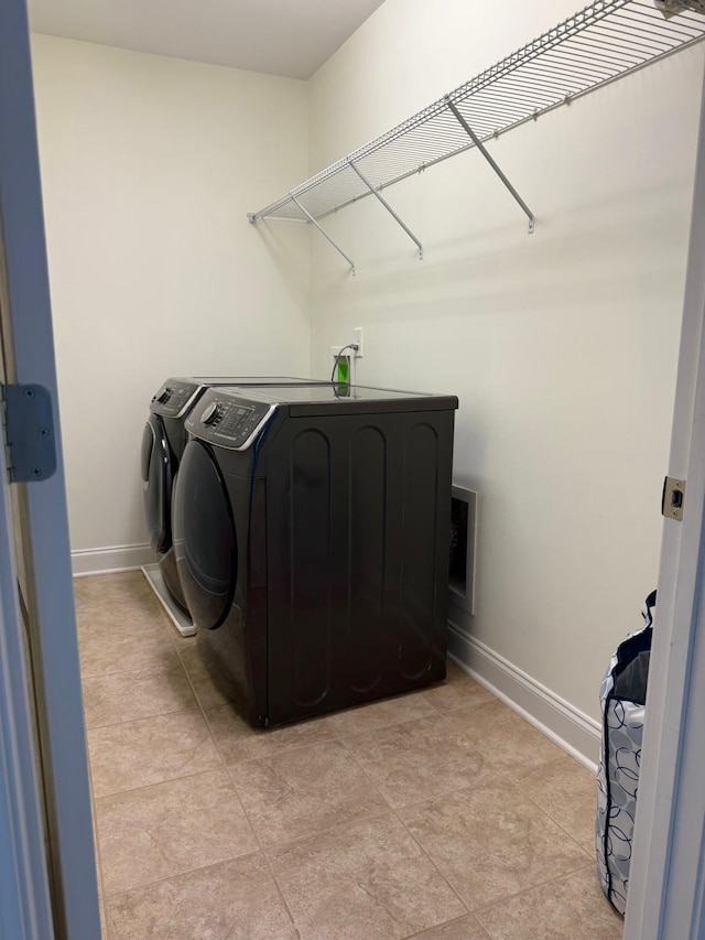 laundry area with washer and dryer