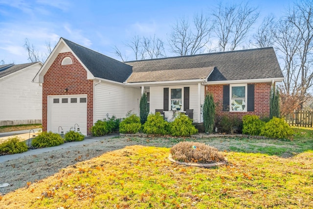 single story home featuring a garage and a front yard