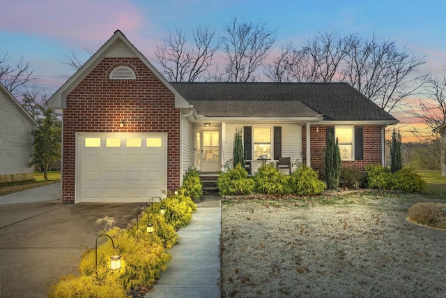 view of front of property featuring a garage