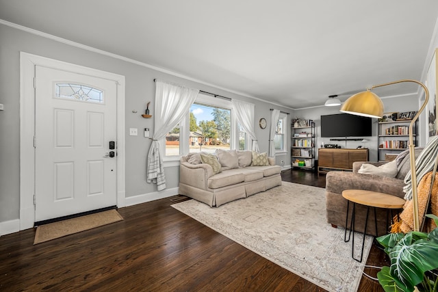 living room featuring crown molding and dark hardwood / wood-style floors