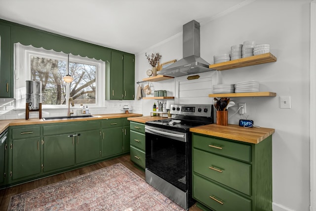 kitchen with sink, butcher block countertops, green cabinets, stainless steel range with electric stovetop, and island exhaust hood