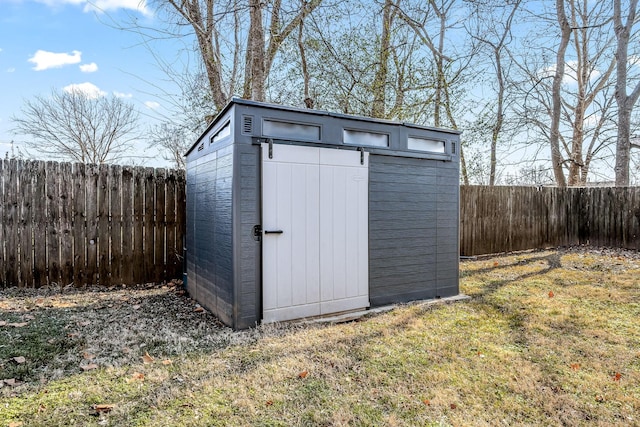 view of outdoor structure with a lawn