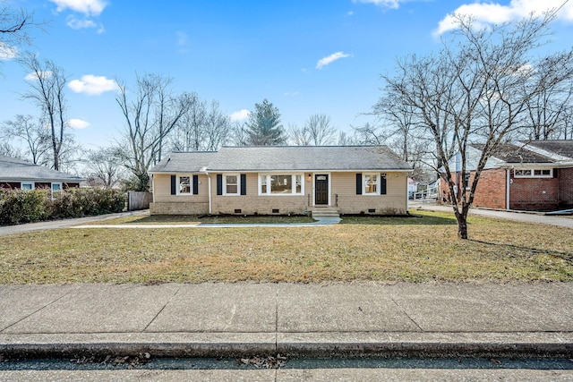 single story home featuring a front lawn