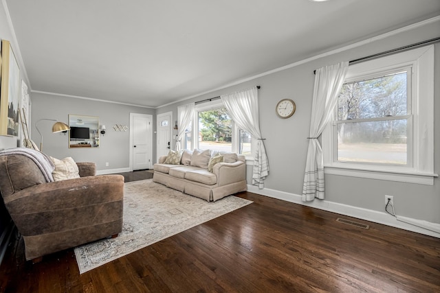 living room featuring ornamental molding and dark wood-type flooring