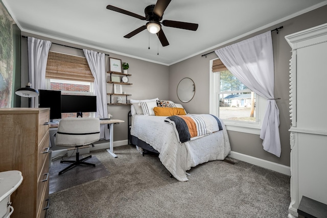 carpeted bedroom featuring crown molding and ceiling fan