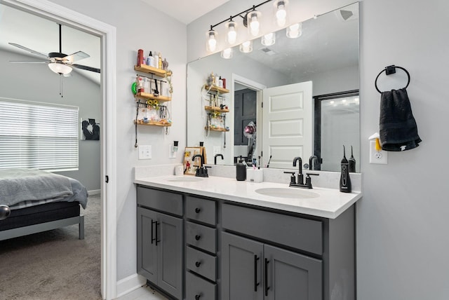 bathroom featuring ceiling fan and vanity