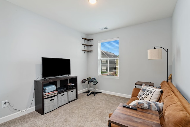 sitting room with light carpet