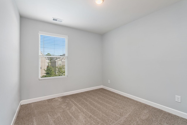 empty room featuring carpet floors