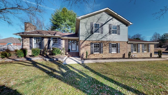 view of front of house with a front lawn