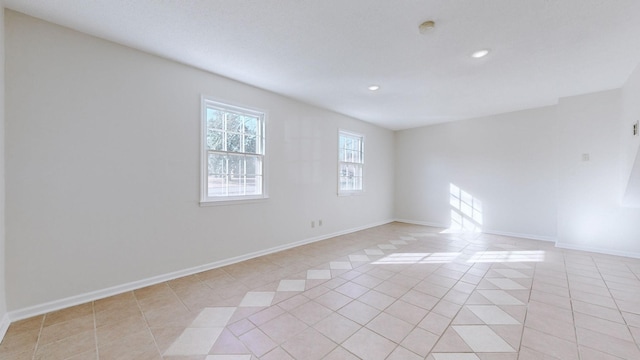 view of tiled spare room