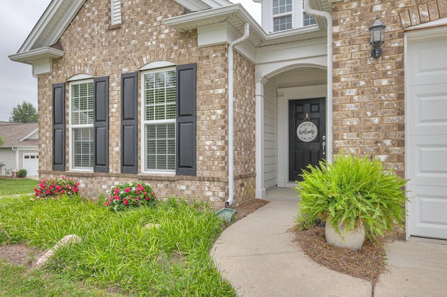 entrance to property featuring a garage