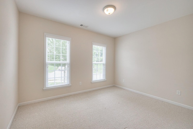 view of carpeted spare room