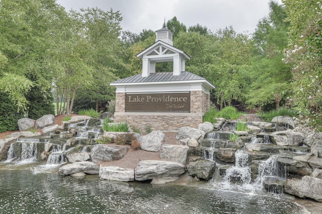 view of community sign