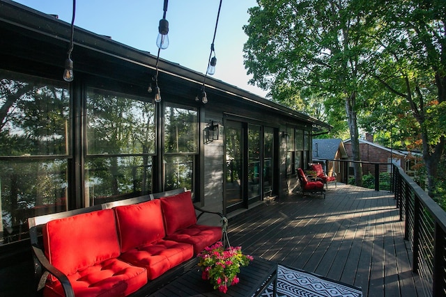 wooden deck featuring an outdoor living space