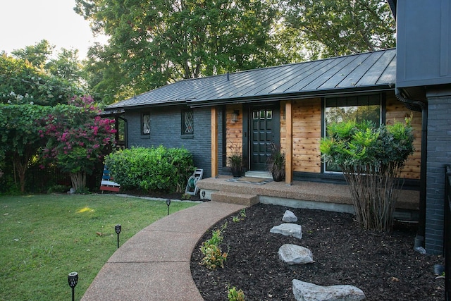 exterior space with a lawn