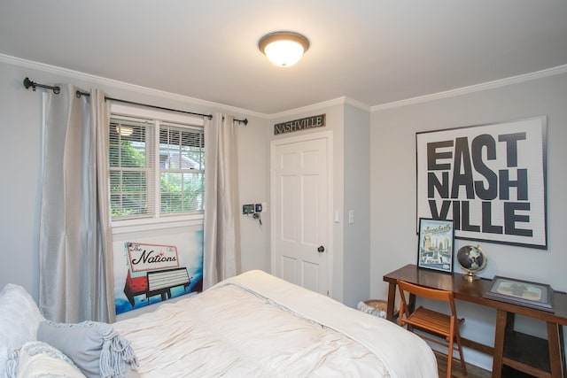 bedroom featuring crown molding