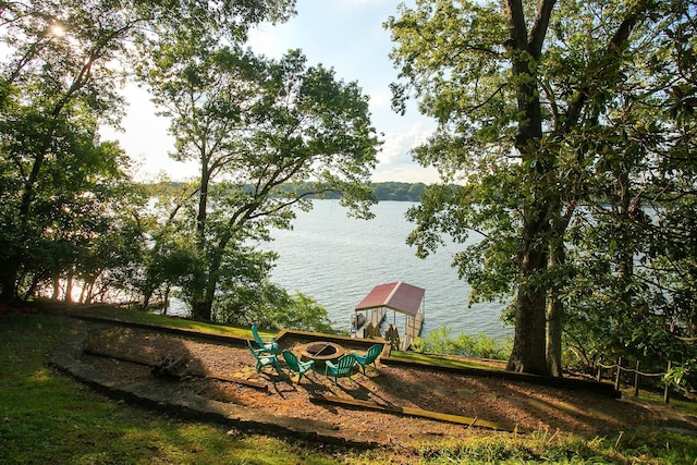 view of jungle gym with a water view