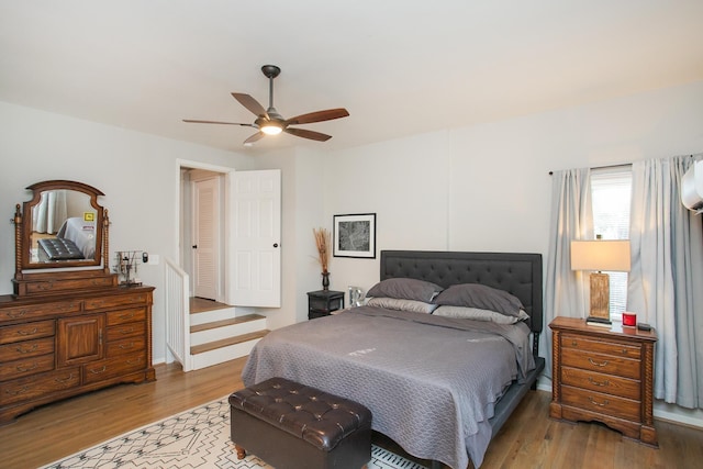 bedroom featuring ceiling fan and light wood-type flooring