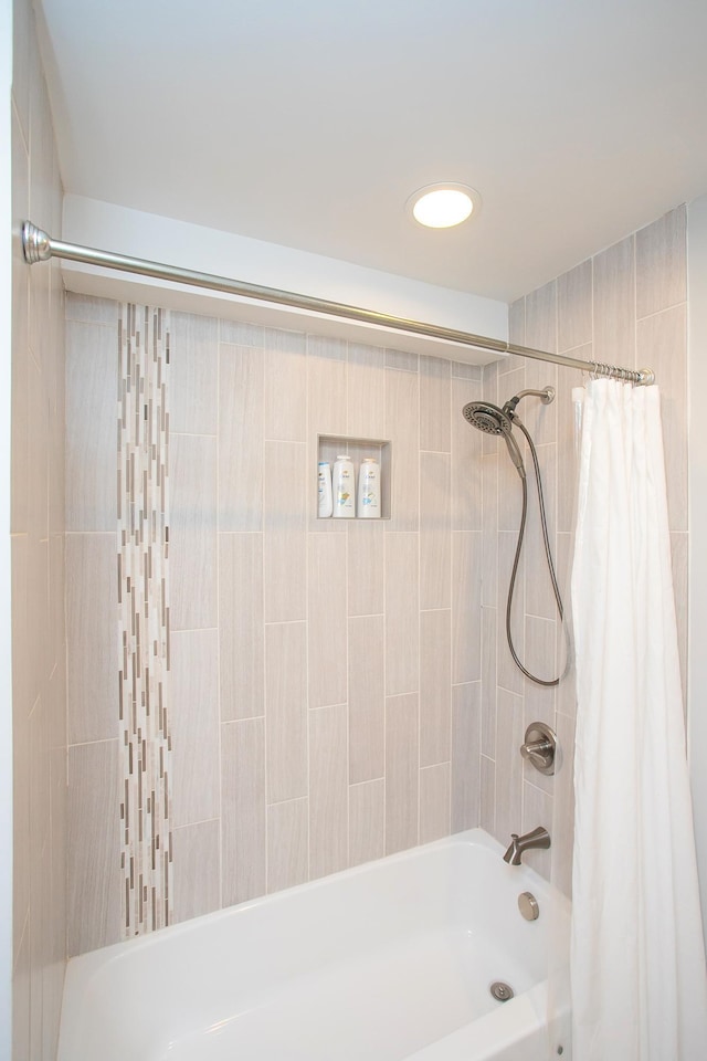 bathroom featuring shower / tub combo