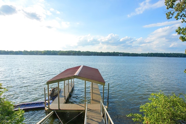 view of dock with a water view