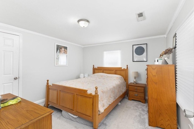 bedroom with light carpet and crown molding