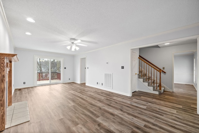 unfurnished living room featuring crown molding, ceiling fan, a textured ceiling, and hardwood / wood-style flooring