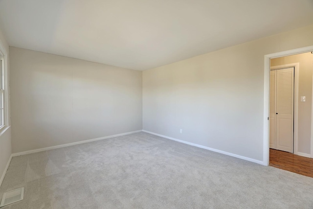 view of carpeted spare room