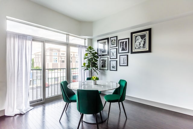 dining area with dark wood-type flooring