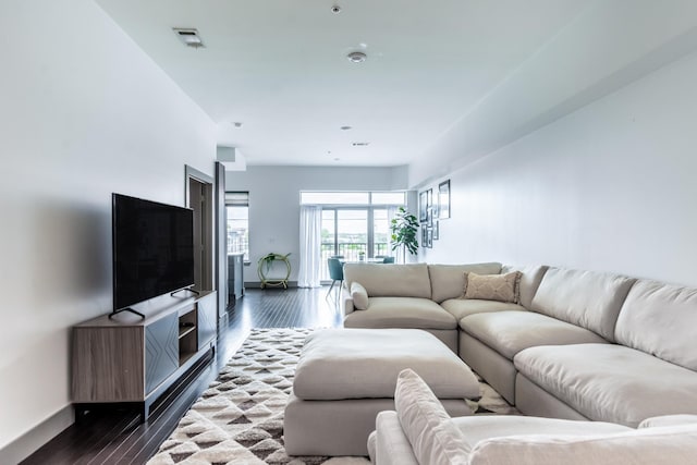 living room featuring dark hardwood / wood-style floors