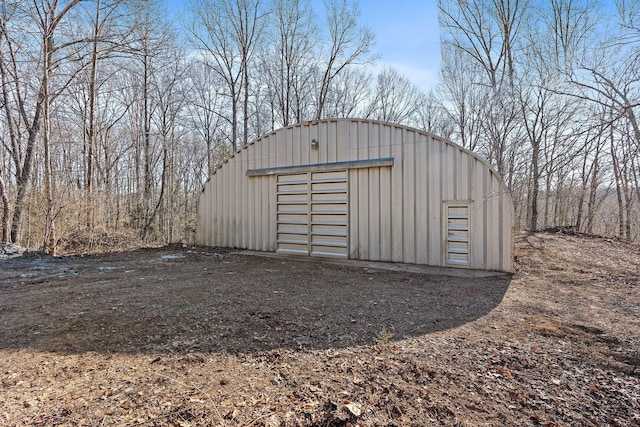 view of outbuilding featuring a garage