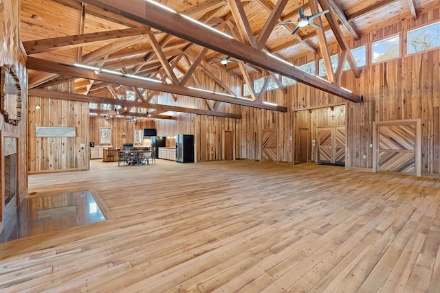 misc room with beam ceiling, ceiling fan, wood ceiling, and high vaulted ceiling