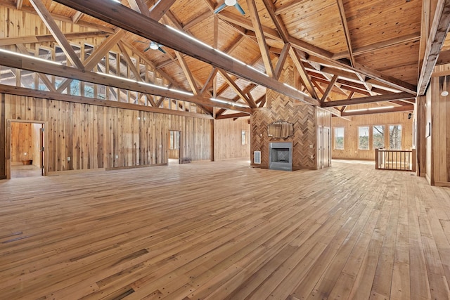 interior space with wood ceiling, beam ceiling, and high vaulted ceiling