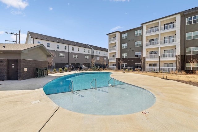 view of pool featuring a patio area