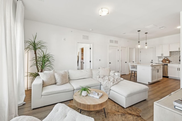 living room with wood-type flooring