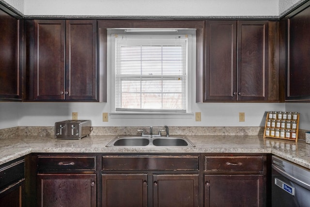 kitchen with dishwasher, sink, and dark brown cabinets