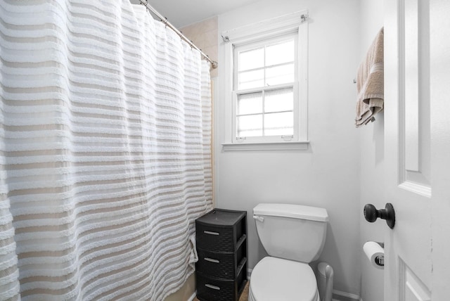 bathroom featuring toilet